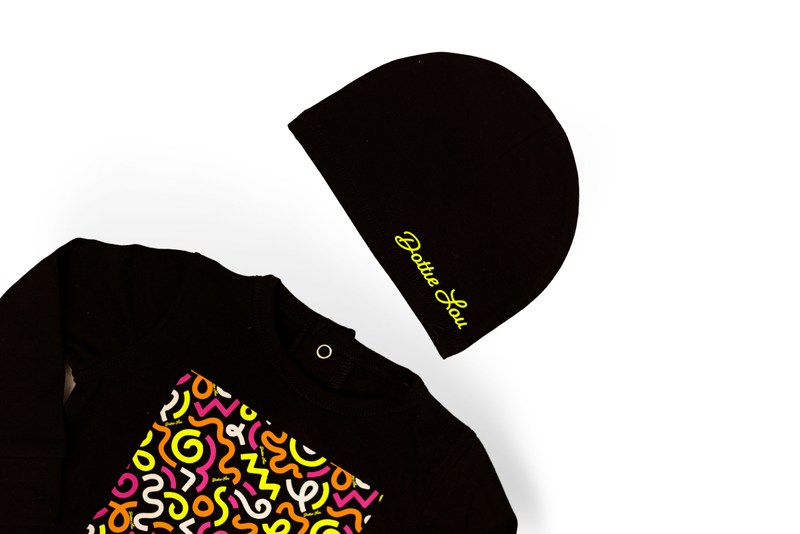 Dottie Lou Brush Pop 2-piece pajama set in black with colourful squiggle doodle print - flatlay product photo