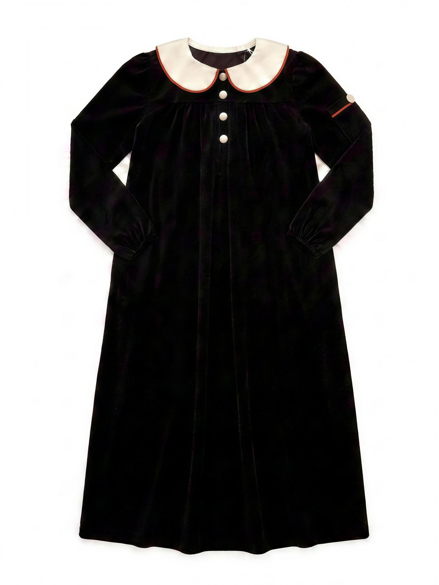 Dottie Lou Classic Noir girls black velour maxi nightgown with ivory Peter Pan collar, terracotta piping and cream knit buttons — flat lay product photo