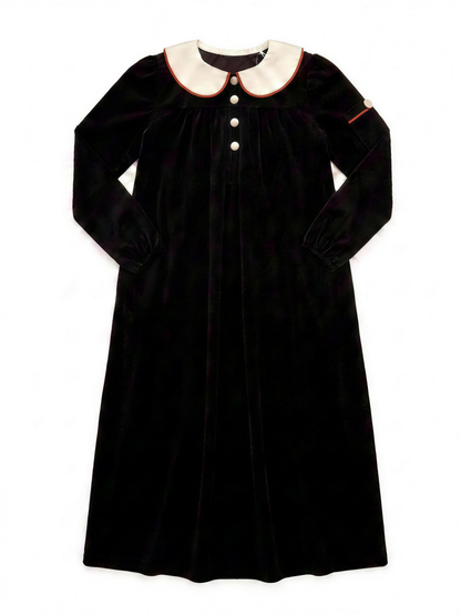 Dottie Lou Classic Noir girls black velour maxi nightgown with ivory Peter Pan collar, terracotta piping and cream knit buttons — flat lay product photo
