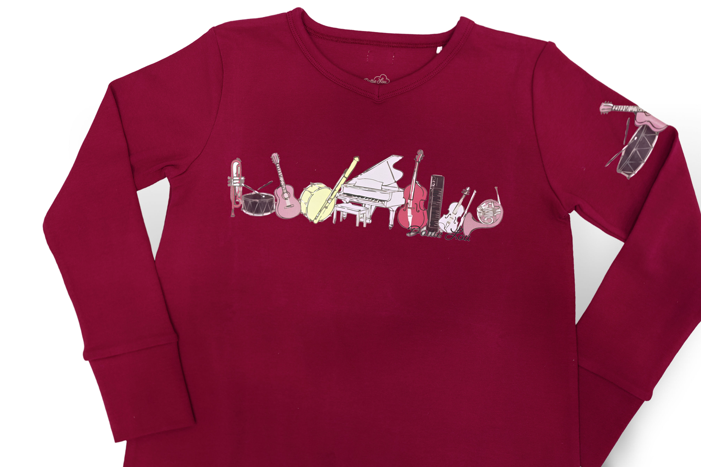 Dottie Lou Melody pajama top in berry with hand-illustrated music print - close-up detail photo