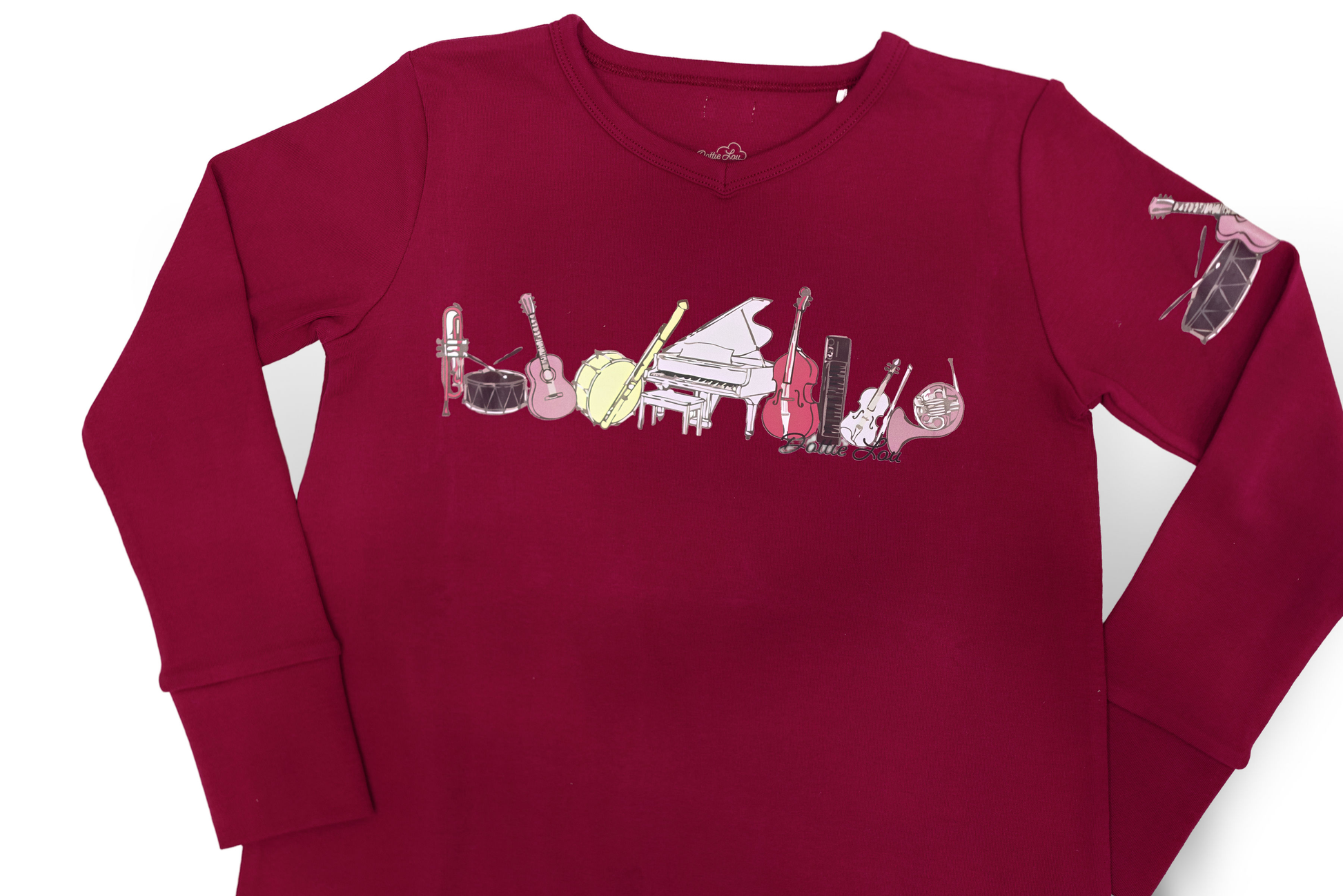 Dottie Lou Melody pajama top in berry with hand-illustrated music print - close-up detail photo